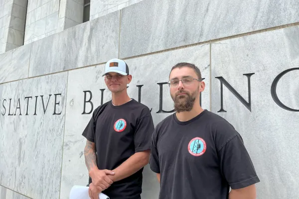 Tower climbers Ryan and Nate outside the state legislature building in New York. 